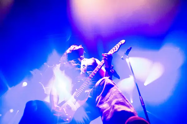 Close-up of Airbag band members during a live music performance